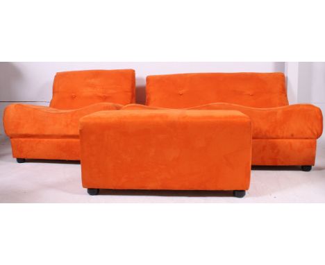 A contemporary retro modular 3 piece suite of serpentine form having stunning orange fabric frame. Comprising sofa armchair c