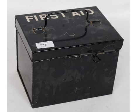 A mid 20th century ebonised First Aid tin, with notation in white to the top, complete with contents. W21 cm 