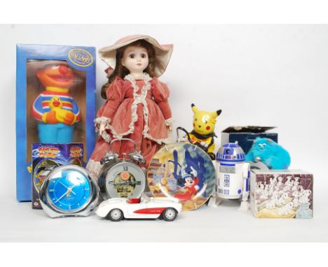 A collection of Disney items, Sesame Street Ernie lamp, a Pokemon clock and other items please see images