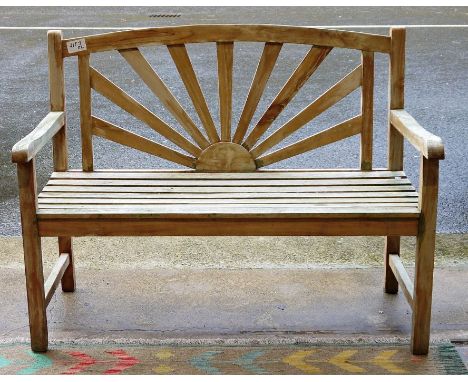 Pair of teak garden benches with 'sunburst'&nbsp; backs 120 cms w.&nbsp;