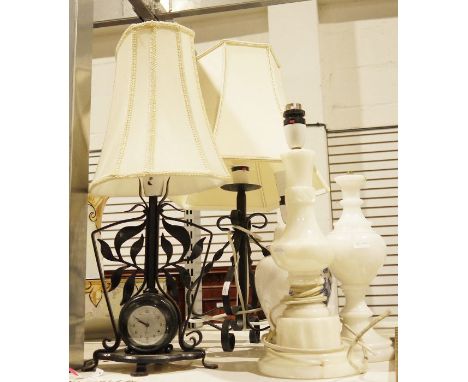 Wrought iron table lamp&nbsp;with clock, another wrought iron table lamp, an alabaster lamp, a marble table lamp,&nbsp;anothe