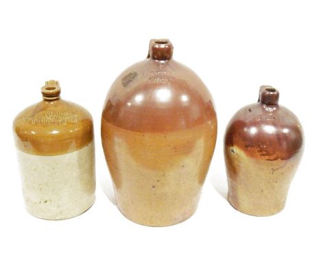 Three large earthenware flagons, one stamped 'Castle Edward &amp; Co Bristol', another 'D Hoare' and another 'Corns Yearsley 