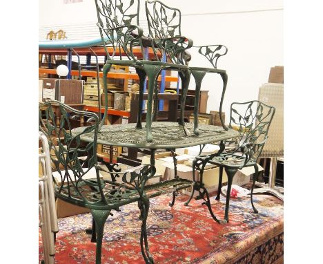 Painted metal Coalbrookdale-style garden table, oval with under-shelf,&nbsp;four chairs and a smaller green painted cast iron