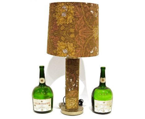 Two empty Courvoisier three star luxe cognac bottles, 3.78L bottles, 38cm high, together with a table lamp of cylindrical for