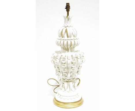 Ornate white ceramic table lamp&nbsp;with applied decoration of leaves and roses, on a circular stepped base, with a painted 