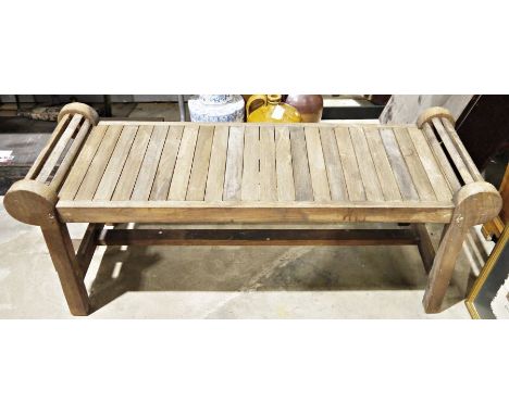 Wooden slatted garden bench&nbsp;with scrolled ends, on four supports, 133cm long x 150cm high&nbsp;