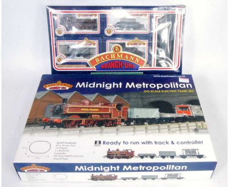 A Bachmann train set containing London Transport pannier tank engine and 3 wagons and track oval still in outer shrink wrap (