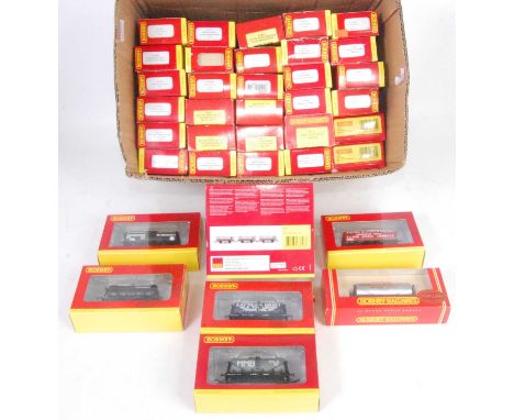 Large box containing 39 Hornby 4 and 6-wheeled tank wagons, mixed liveries, some weathered (VG-M) (BE-M)