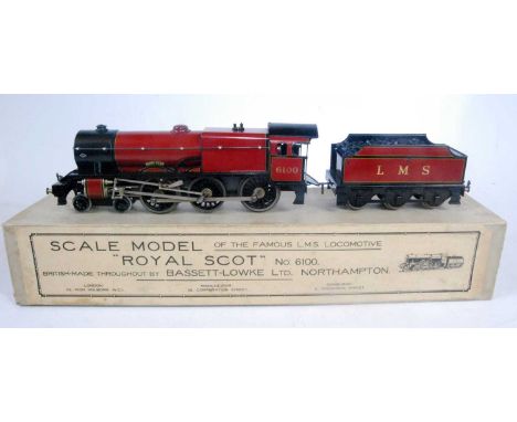 A Bassett-Lowke 8V DC electric maroon Royal Scot engine and tender, touching in evident on tender buffer beam, coal added to 