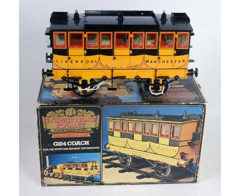 A Hornby Railways 3½" gauge No. G104 Stephensons Rocket coach, housed in the original all-card box with packing piece and car