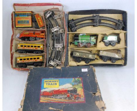 Two 0 gauge sets: M1 goods set, green loco with 3435 tender with one each GW and NE open wagons, incomplete circle of track, 
