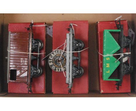 Three Hornby LMS goods wagons:- 1948-54 hopper, black base, green body, yellow "LMS" (NM-BE), 1939-41 flat truck with B1 cabl