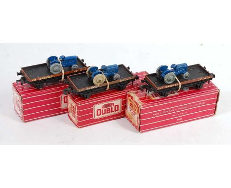 Three 4649 Hornby Dublo low sided wagons with tractor 2x (M) and 1x (VG) boxed (P-F)