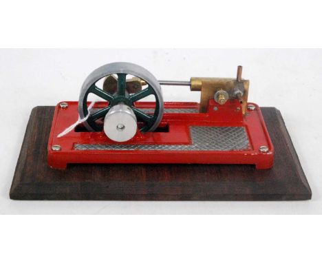 A kit built stationary steam horizontal mill engine of simple construction comprising of single cylinder with cast and exhaus