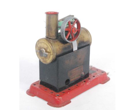 A Mamod boxed and loose stationary steam plant group to include a Minor 2 steam engine with burner and funnel and other compo