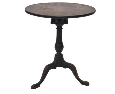 A 19thC mahogany tilt top table, the circular top on a turned column and tripod base.