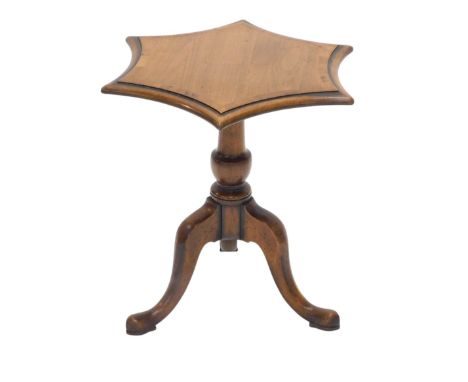A walnut occasional table, the hexagonal cross banded top with moulded shaped edges, on turned column and tripod base, stamp 