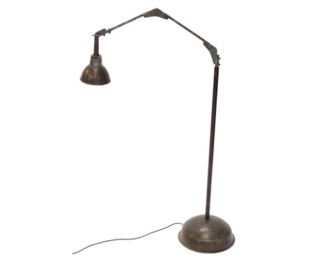 An industrial adjustable steel floor lamp, with domed foot, 100cm high. WARNING! This lot contains untested or unsafe electri