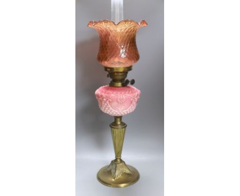 A Victorian brass and coloured glass oil lamp - 70cm high