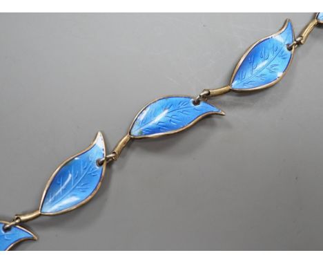 A Norwegian 925 gilt white metal and blue enamel leaf link bracelet by David Andersen, 17cm.