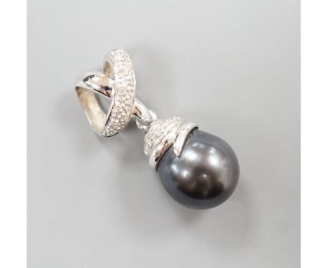 A modern 14k white metal, Tahitian cultured pearl and diamond chip set drop pendant, overall 30mm, gross weight 6.8 grams.
