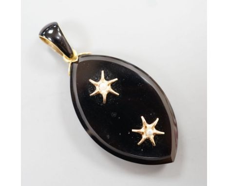 A Victorian yellow metal, black enamel, black onyx and seed pearl set mourning pendant, 57mm.