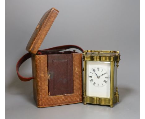 A cased brass repeating carriage clock, in case,12 cms high.