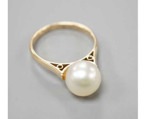 A modern 14k and single stone cultured pearl set ring, size H/I, gross weight 2.1 grams.