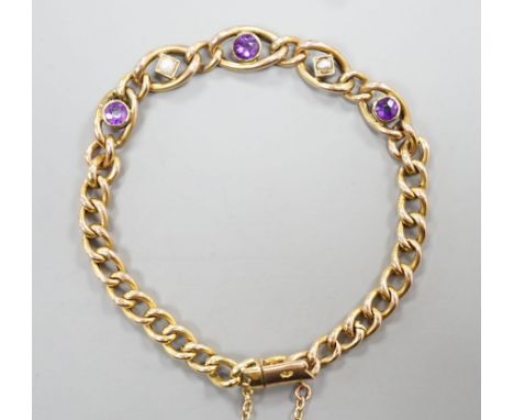 An Edwardian 9ct, amethyst and seed pearl set bracelet, 18cm, 6.1 grams.