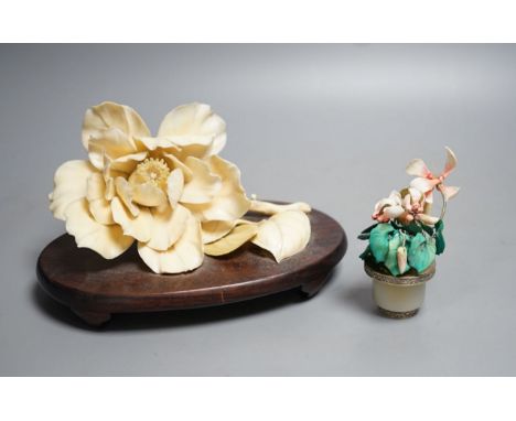 A Chinese ivory model of a peony flower on stand and a Chinese coloured ivory model of flowers with a white jade and white me