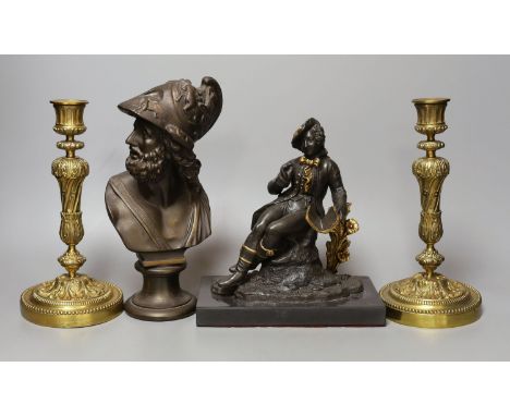 A pair of cast brass candlesticks, 22cm, a bearded portrait bust and a seated figure