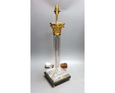 An ormolu and glass lamp - 58cm tall