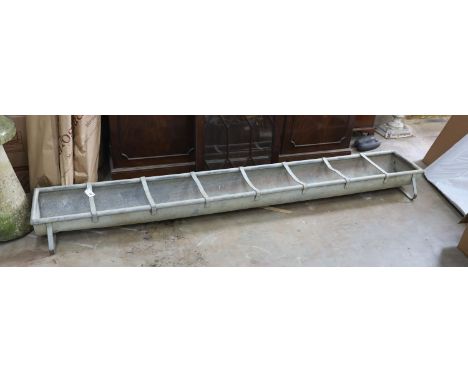 A large vintage galvanised water trough, length 246cm, depth 34cm, height 20cm