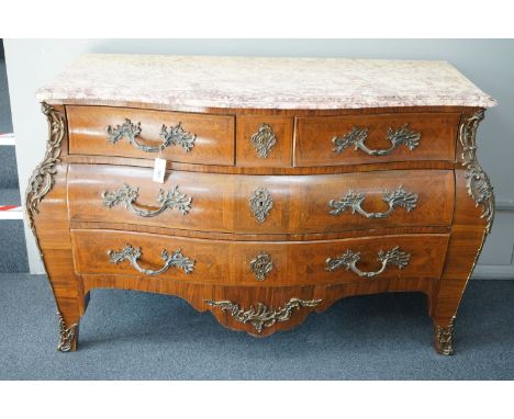 A Louis XV style marble topped serpentine bombe commode - impressed maker's stamp, M.P., width 140cm, depth 59cm, height 90cm