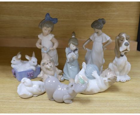 A selection of Lladro and Nao figures