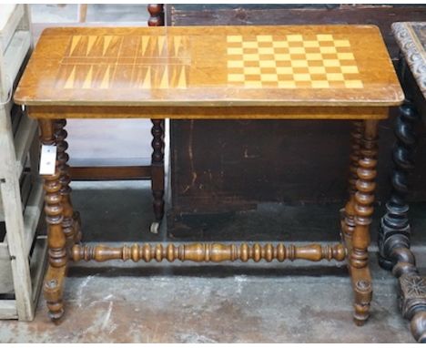 A Victorian inlaid rectangular walnut games table with chess and backgammon surface, width 87cm, depth 43cm, height 69cm