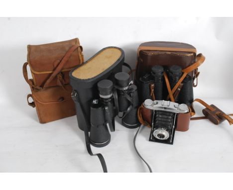 2 cased binocular sets together with an AGFA Isolette camera and canvas bagged box brownie kodak camerascol