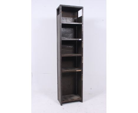 An original mid 20th century Industrial upright enamel painted metal dresser cubby cabinet. The heavy large base with section