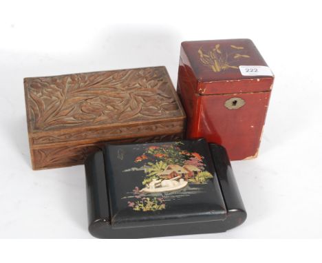A Chinese laquered tea caddy and jewellery box together with another wooden box