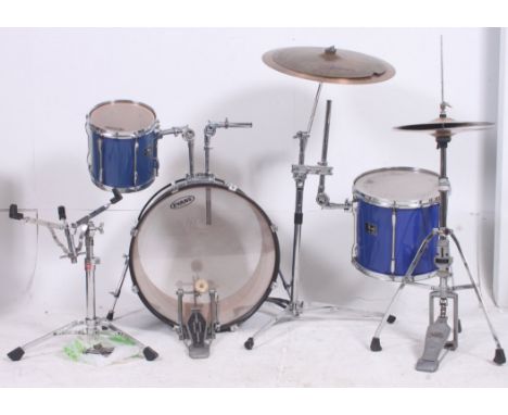 A Pearl Drum kit comprising Bass drum, symbals, tripods etc