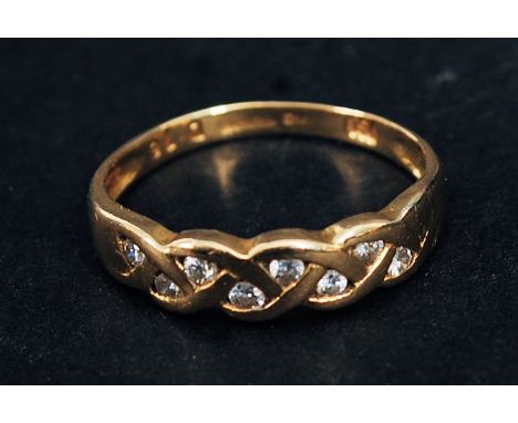 An 18k yellow gold diamond ring, 16 points.  Size M, weight 2.2g