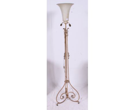 A 20th century tall freestanding rococo painted white metal standard lamp with uplighter shade