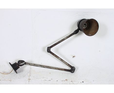 A vintage ex Douglas Motorcycle Factory anglepoise lamp raised on tubular adjustable arm with pendant shade.  Extendable 74cm