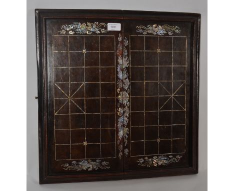A good 20th century carved hardwood chessboard, with delicate inlaid mother of pearl decoration in the form of a Chinese drag