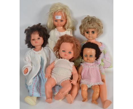 DOLLS: A collection of 5x vintage dolls, one being a Palitoy made doll, and four others. Each with clothing.