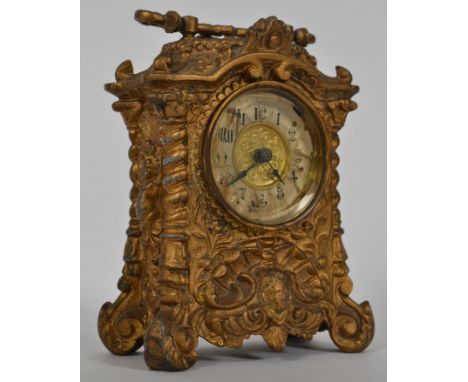 A Victorian cast ormulu mantel clock stamped Made In Britain to movement.