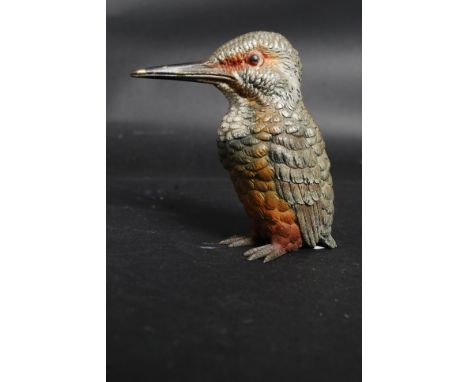 A 20th century unmarked bronze cold painted figure of a woodpecker bird.
