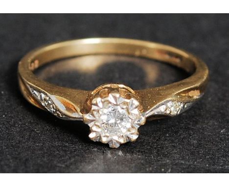 A 9k yellow gold diamond ring, 10 points. Size N , Weight 2.3grams