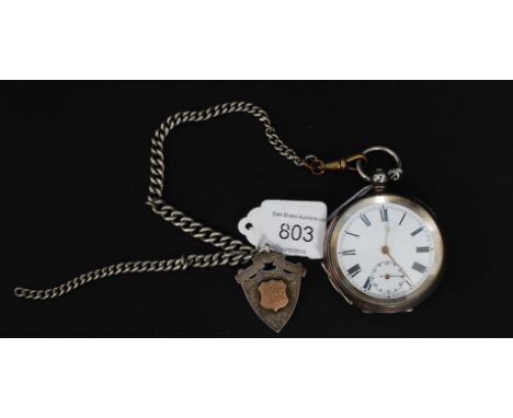 An early 20th century silver 935 marked pocket watch and silver albert chain. The lever movement with enamel face having subs