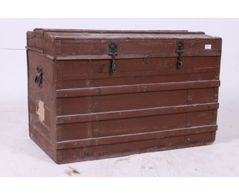 A good Victorian dome top canvas and wooden strapped steamer trunk having hinged lid. H60cm x W90cm x D48cm